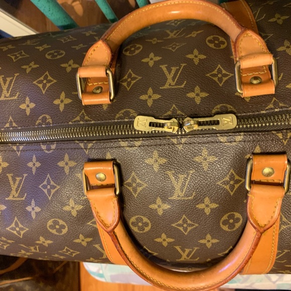 Authentic Louis Vuitton Keepall55 with strap - Picture 2 of 14
